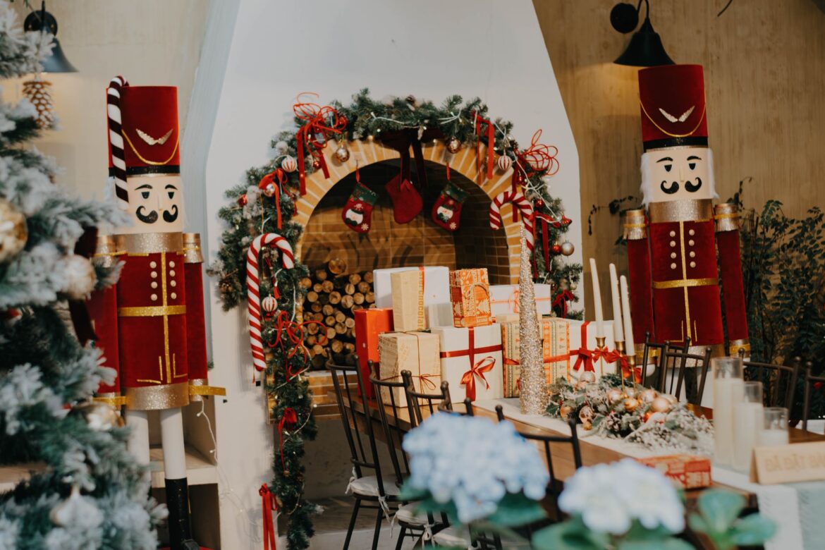 Elegant Christmas setting with nutcracker soldiers, garlands, and wrapped presents.